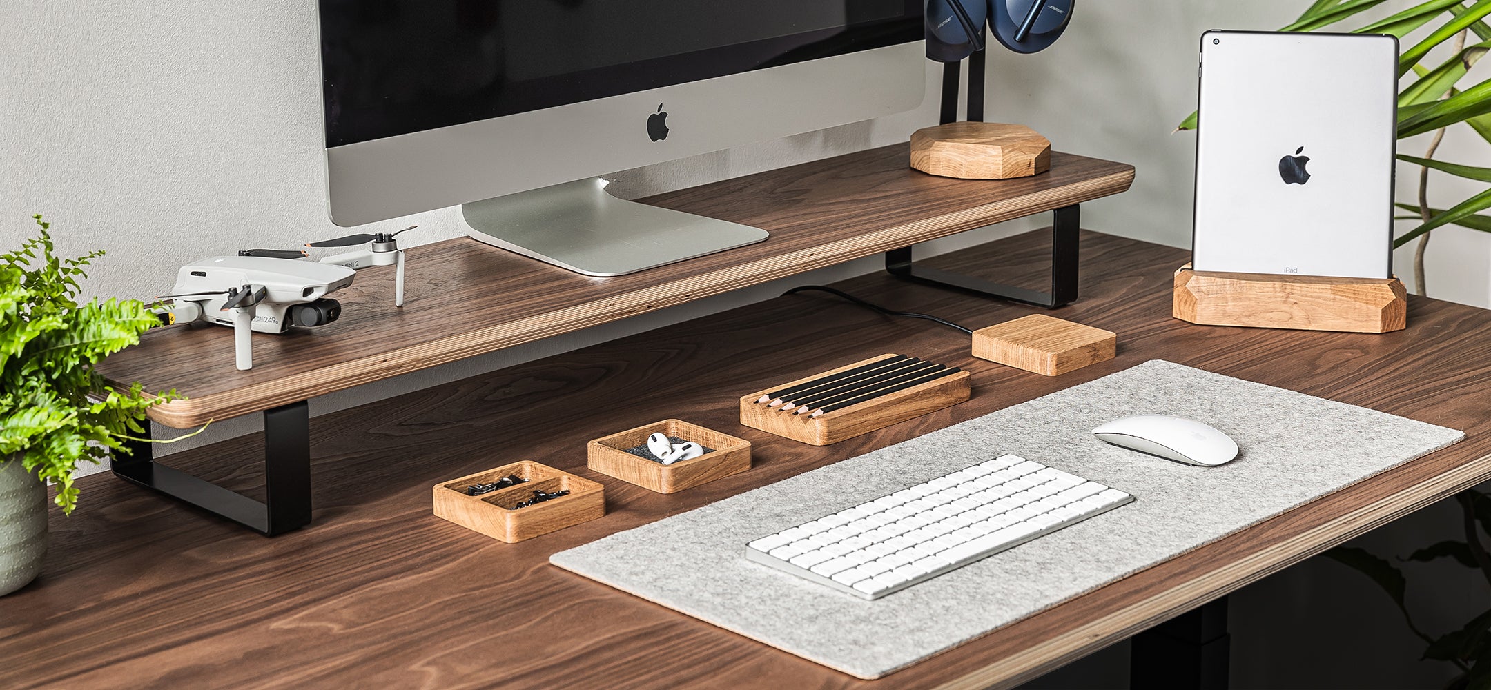 A collection of desk accessories made of solid American walnut and oak wood.
