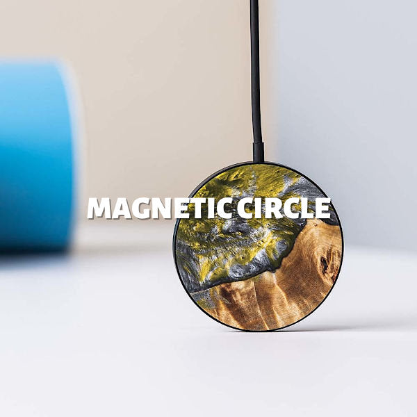 Circle wireless phone charger made of resin and wood, compatible with Magsafe.